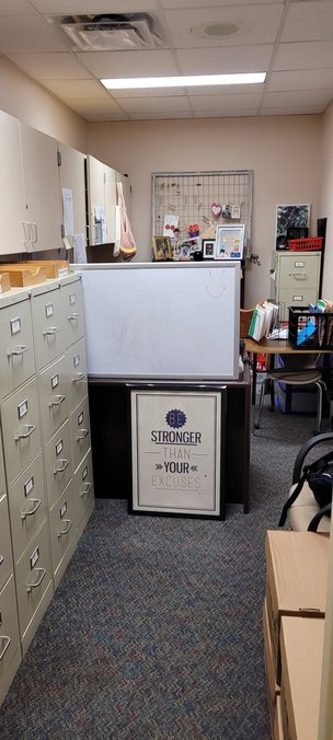 Storage and cramped spaces are a problem for Winborn staff. One of Winborn’s administrative staff works out of this converted file and supply storage room – essentially a closet – which was made into makeshift office space.